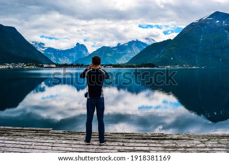 Similar – Image, Stock Photo Reflection of mountain and trees on lake in dolomite