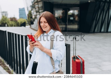 Similar – Foto Bild Frau mit rotem Koffer auf Bodenkontrollkompass