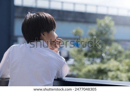 Similar – Image, Stock Photo teenager in uniform wonders about the sharpness of the sickle she is holding in her hand … and at the same time is a little worried she might hurt herself