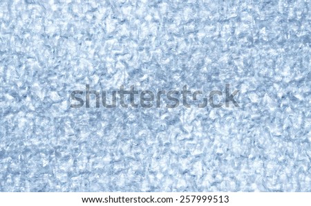 An icy silver texture. A back side of the heat insulation material.