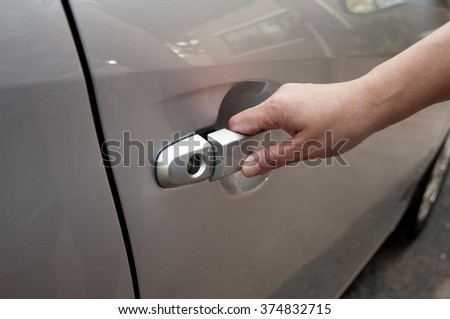 car door handle hand pull hand on handle closeup opening car door ez canvas car door handle hand pull hand on handle closeup opening car door ez canvas
