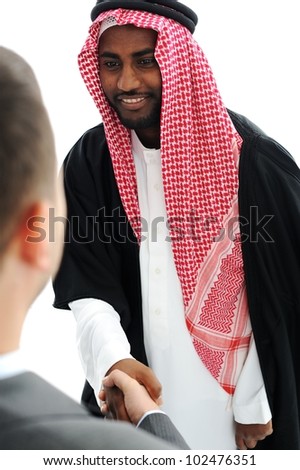 Business people at Middle East shaking hands