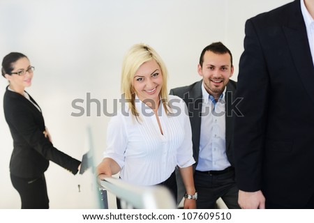 Successful business people on stairs