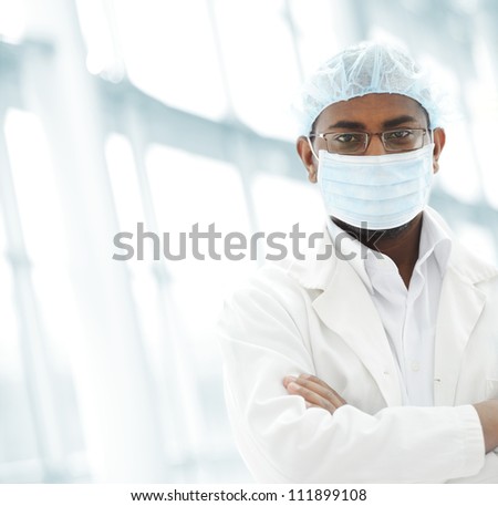 Arabic doctor with mask in hospital