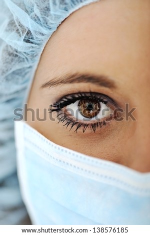 Close-up of urgent medic eye female doctor