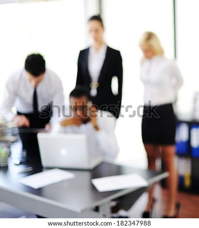 Business people working in office (note: image is out of focus)