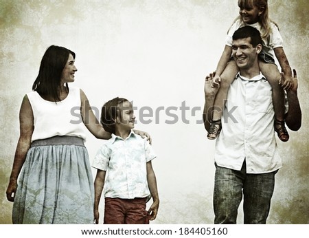 Filtered photo of a young family in nature