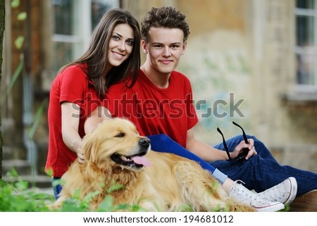 Urban stylish trendy young teenage people with dog