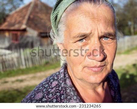 Portrait of senior country woman outdoors