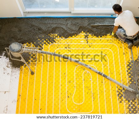 Installing underfloor heating and colling pipes modern system