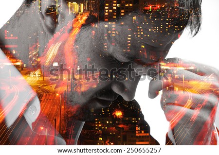 Desperate man on night city blurred lights