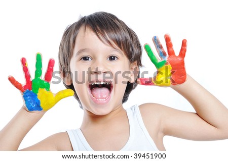 Happy kid with paints on hands