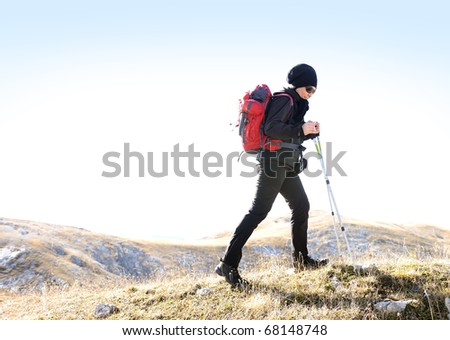 Sport hiking in mountains, walking and backpacking
