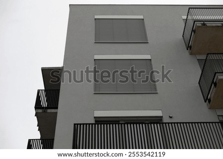 Similar – Foto Bild Hausfassade mit nach außen geöffneten Fenstern