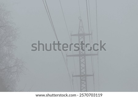 Similar – Image, Stock Photo surreal | power pole in morning light as reflection in a puddle