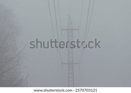 Similar – Image, Stock Photo surreal | power pole in morning light as reflection in a puddle