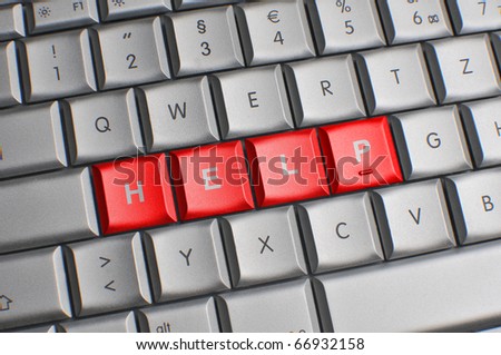 Computer keyboard with red help keys