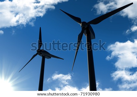 Wind turbines (power generating windmills) in the sun