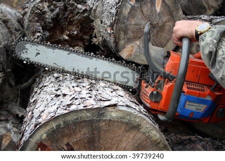 The tool a mechanical saw Ã¢Â?Â? the good help in a hard work