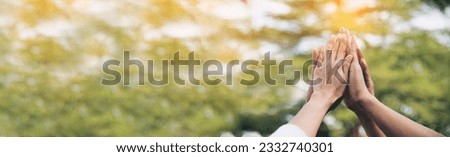 Similar – Image, Stock Photo Hands raising up and down on background of grey wall