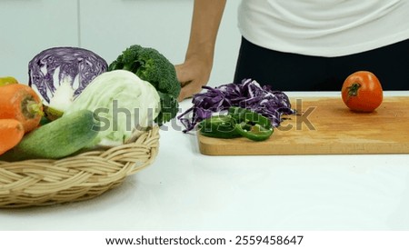 Similar – Image, Stock Photo Crop woman with slice of lemon