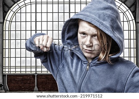 Angry young girl is ready to fight