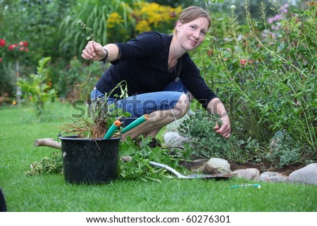 Woman works in the garden