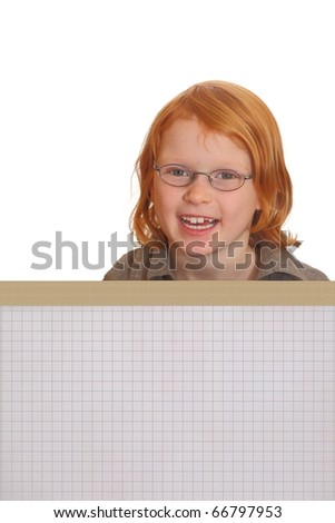 Clever red-haired girl behind a banner ad