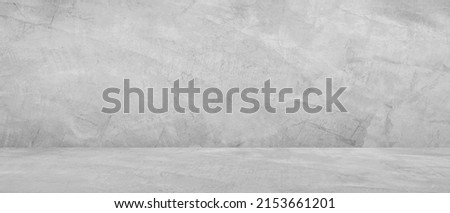 Backdrop Background, Empty Gray Cement wall room interior studio Background and rough floor perspective well editing montage display products and text present on free space concrete Backdrop Scene. Foto d'archivio © 
