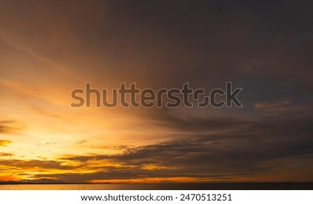 Similar – Foto Bild Abendlicher Himmel mit orange, blau und grau in horizontaler Aufnahme