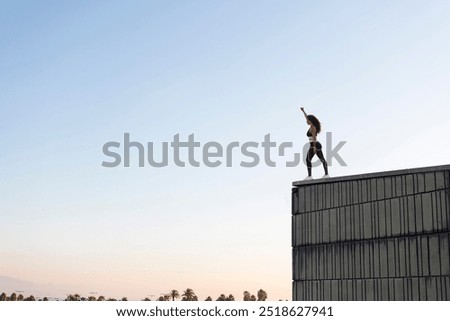 Similar – Image, Stock Photo Unrecognizable female athlete with mobile phone