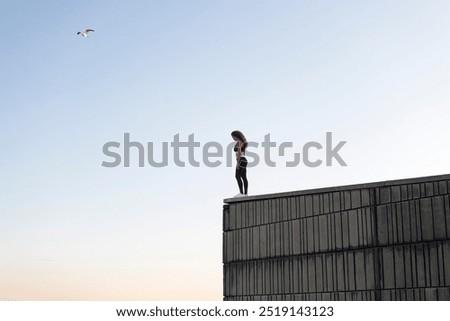 Similar – Image, Stock Photo Unrecognizable female athlete with mobile phone