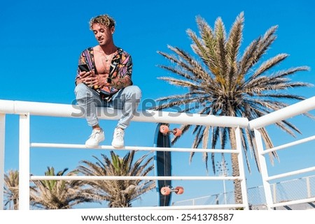 Similar – Image, Stock Photo Carefree male skater browsing cellphone in city