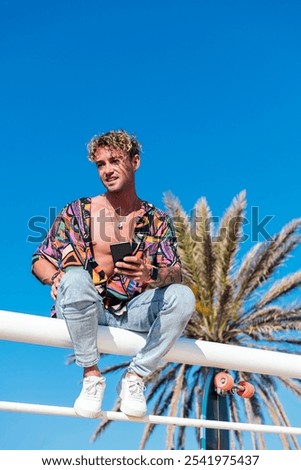 Similar – Image, Stock Photo Hipster skater sitting on skateboard near ramp