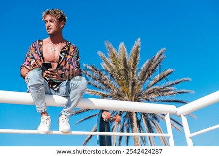 Similar – Image, Stock Photo Carefree male skater browsing cellphone in city