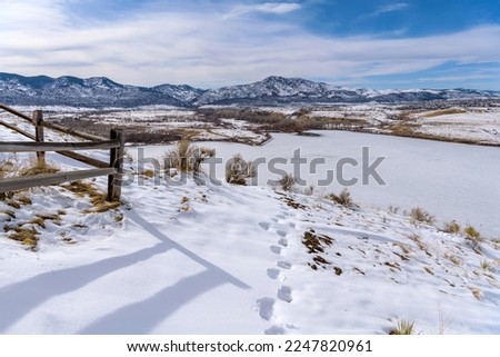 Similar – Image, Stock Photo Winter hiking trail in the spruce forest. Threateningly falling lines.