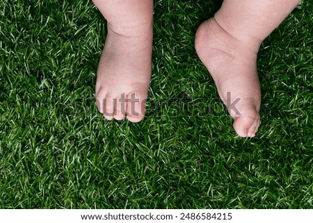 Image, Stock Photo Anonymous delicate mother sitting on floor with newborn at home