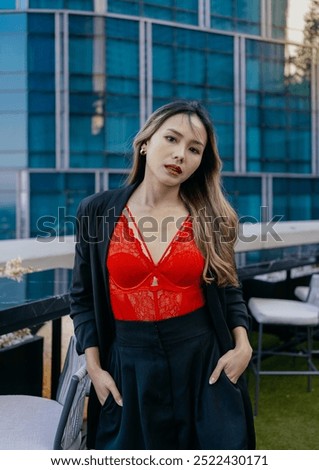 Similar – Image, Stock Photo Young blonde asian woman in knitted turtleneck sweater with fairy lights and bokeh around