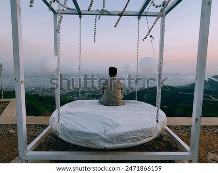 Similar – Image, Stock Photo Anonymous man enjoying mountain landscape and lake