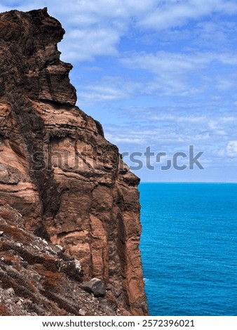 Similar – Image, Stock Photo Shore with rough mountain ridge