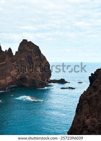 Similar – Image, Stock Photo Shore with rough mountain ridge