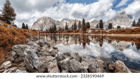 Similar – Image, Stock Photo Tofana di Rozes reflected in small pond on Passo Falzarego, Dolomites in the Province of Belluno, Veneto, Italy