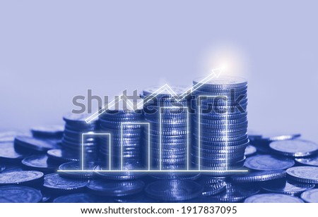 coin stack with growth chart for financial and banking concept. investing economic growing.