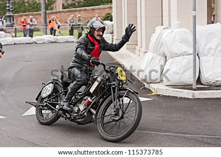 LUGO, RA, ITALY - SEPTEMBER 30: unidentified  biker riding an old racing motorcycle Scott TT at motorcycle festival \