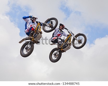 VOLTANA DI LUGO (RA) ITALY - APRIL 7: two unidentified bikers make a jump at the trial show, during the motorcycle rally \
