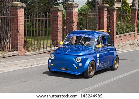 BORGO RIVOLA (RA), ITALY - MAY 1: unidentified driver on a vintage italian tuned car Fiat 500 running in rally for classic cars \