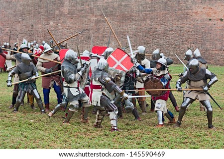 TERRA DEL SOLE, ITALY - SEPTEMBER 29: warriors in historical re-enactment of medieval battle at festival  \
