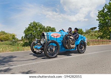 COLLE DI VAL D\'ELSA, SI, ITALY - MAY 17: unidentified crew on an old sport car Bugatti T 13 Brescia Corsa (1928) runs in historical race Mille Miglia, on May 17, 2014 in Colle di Val d\'Elsa, SI, Italy