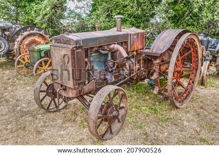 BASTIA,RA, ITALY - APRIL 26: old american tractor Case C (circa 1930) starting handle, at rally for old tractors during the village fair \