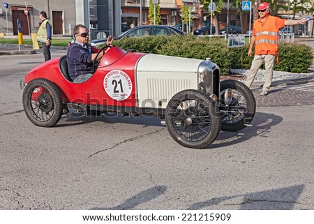 LUGO, RA, ITALY - SEPTEMBER 21: the crew W. Nuetzi J. Geissmann on old french car Amilcar CGSS (1928) in historic race for classic cars \